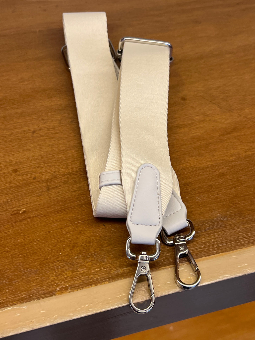 Elegant Ivory Shoulder Bag with Flap Closure