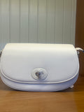 Elegant Ivory Shoulder Bag with Flap Closure