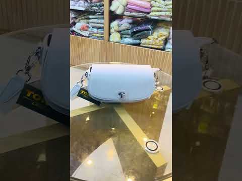Elegant Ivory Shoulder Bag with Flap Closure